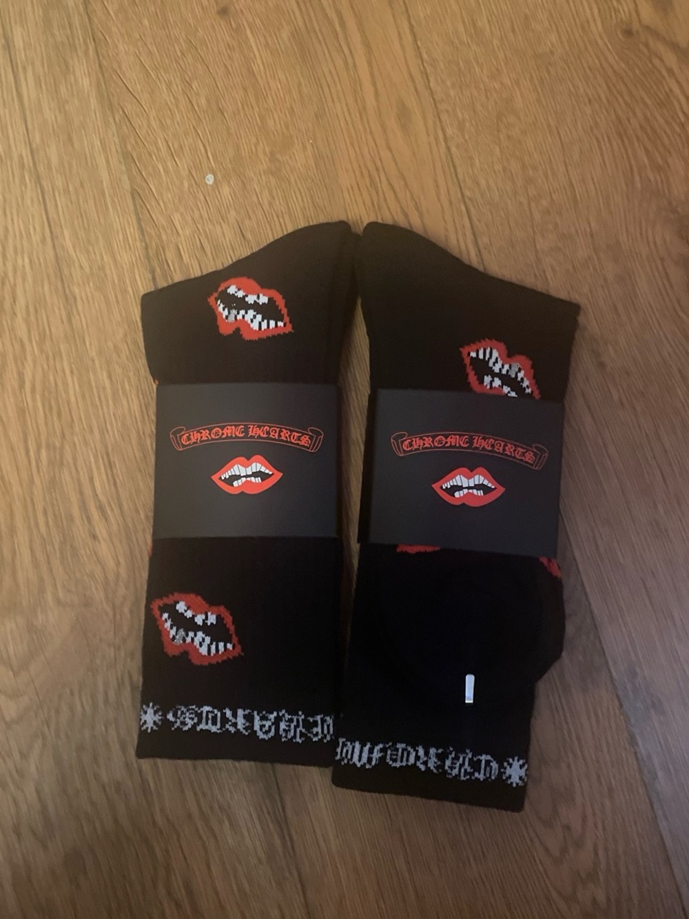 Chrome Hearts Black Crew Socks with Red Lip Motif you get both pairs